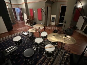 This image shows a view of the main drum room at Chicago's Uptown Recording studio from behind the drum kit.